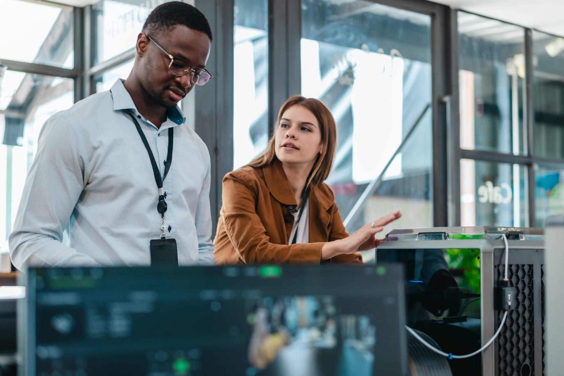 two-product-designers-testing-3d-printed-prototype | CMIT Solutions two-product-designers-testing-3d-printed-prototype