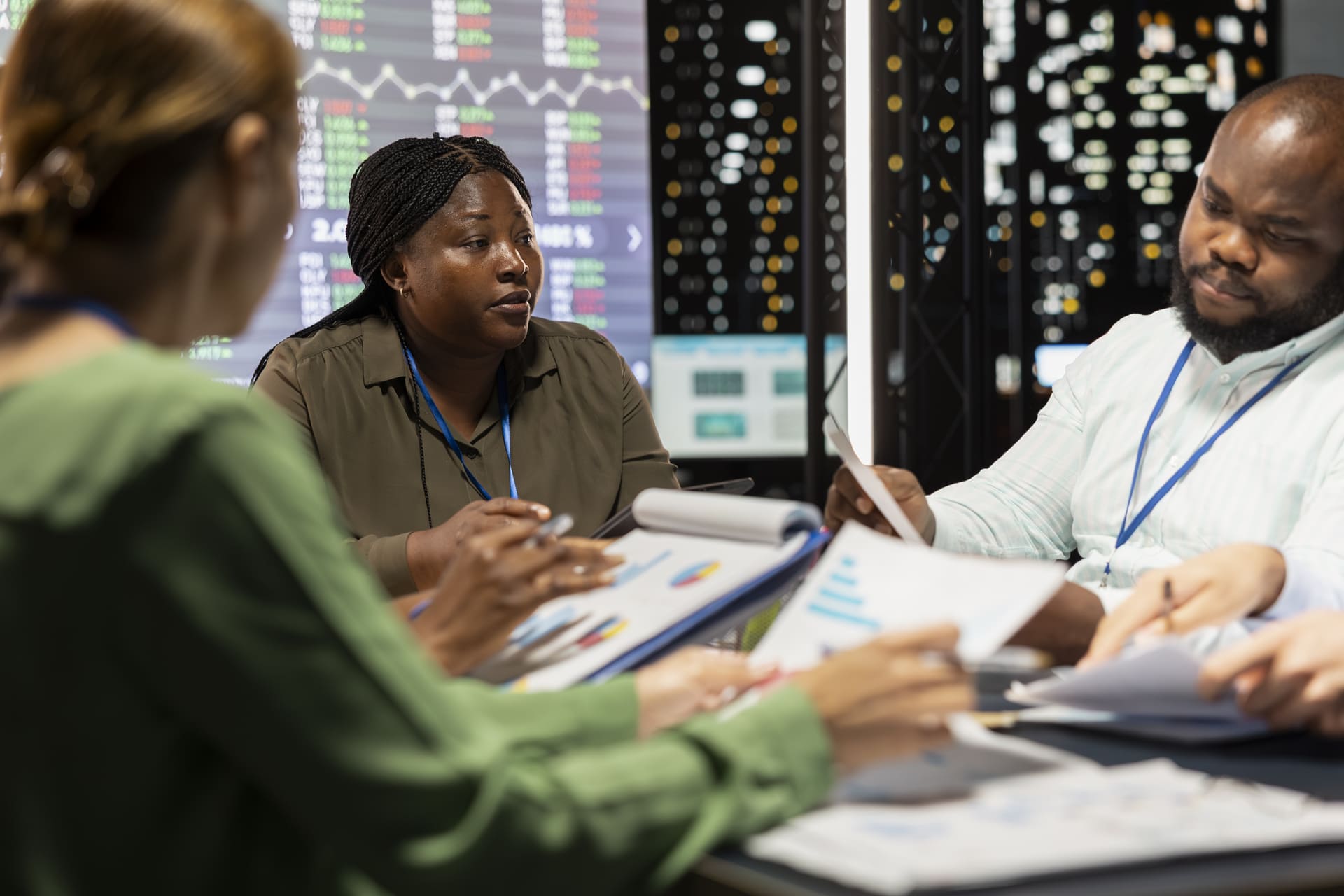 Team reviewing financial reports | CMIT Solutions Team reviewing financial reports