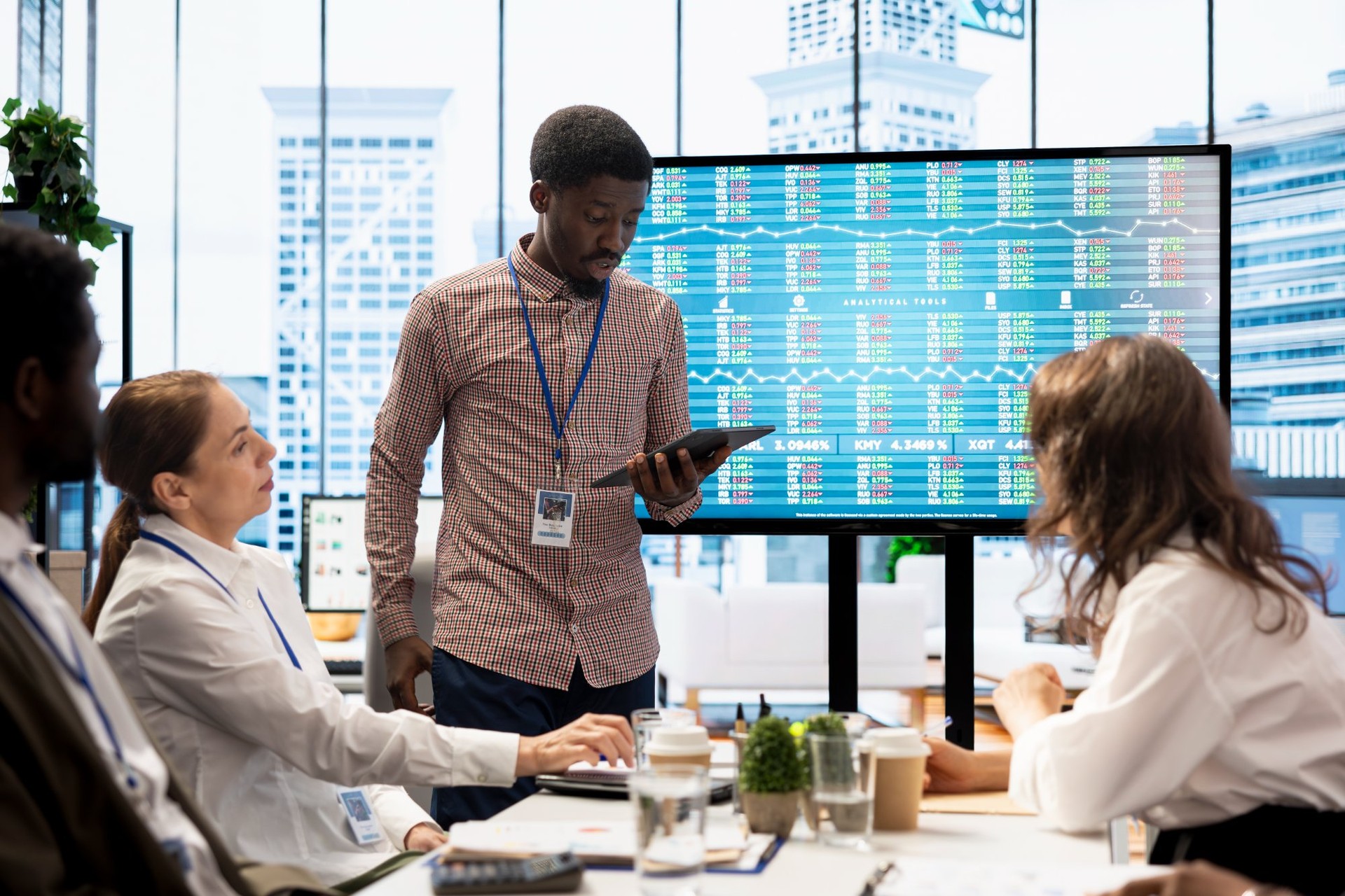 business-team-analyzing-sales-data-presentation-screen | CMIT Solutions business-team-analyzing-sales-data-presentation-screen