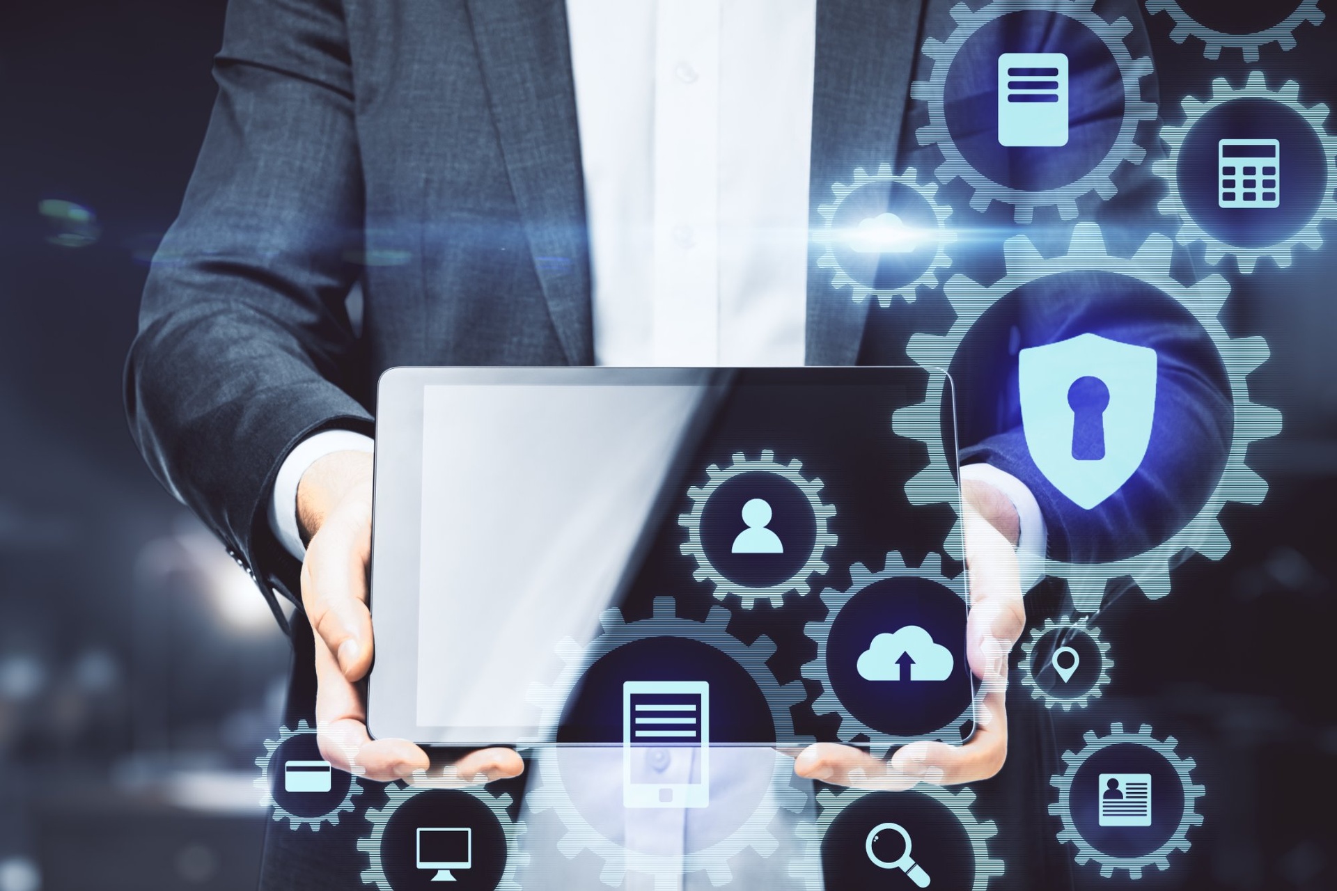 businessman-tablet-digital-security-gears-interface-technology | CMIT Solutions businessman-tablet-digital-security-gears-interface-technology