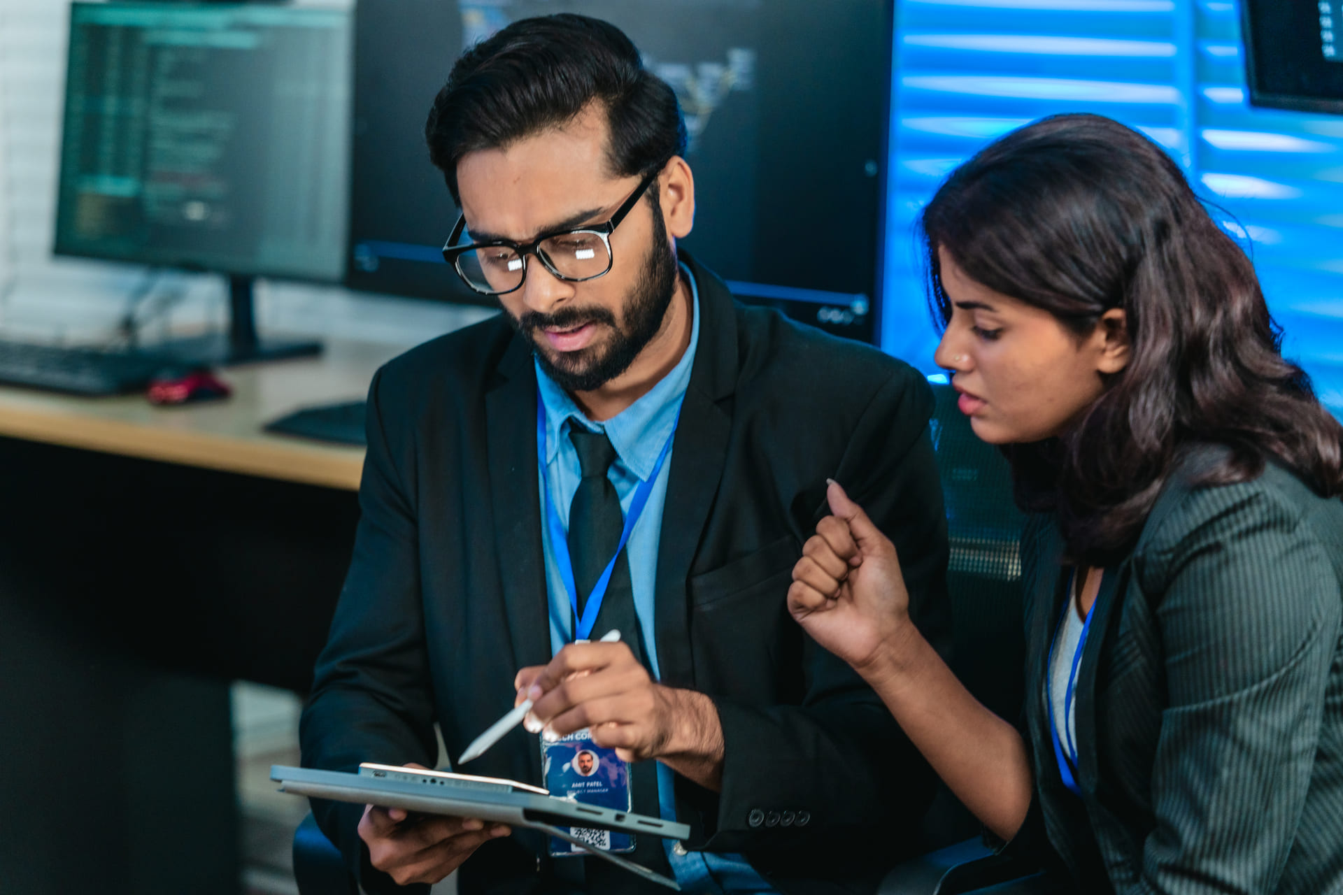 software-developers-discussing-code | CMIT Solutions software-developers-discussing-code