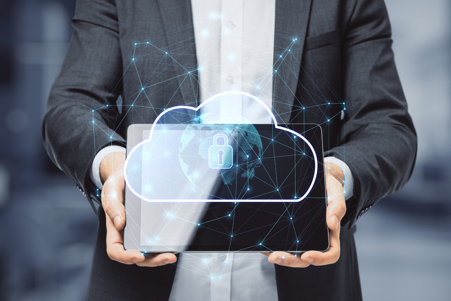 businessman-holding-tablet-secure-cloud-lock-network | CMIT Solutions businessman-holding-tablet-secure-cloud-lock-network