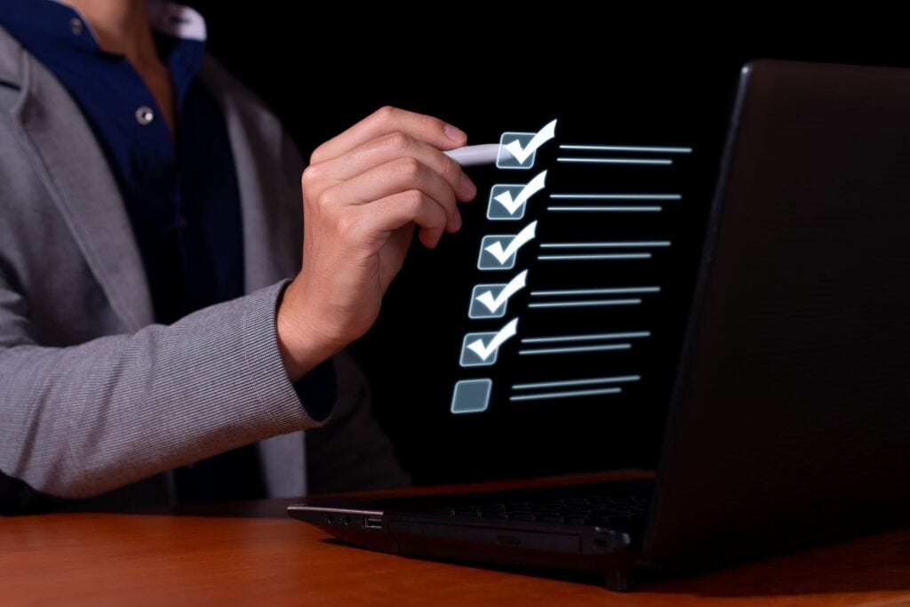 businessman-marks-the-checklist-for-document-control