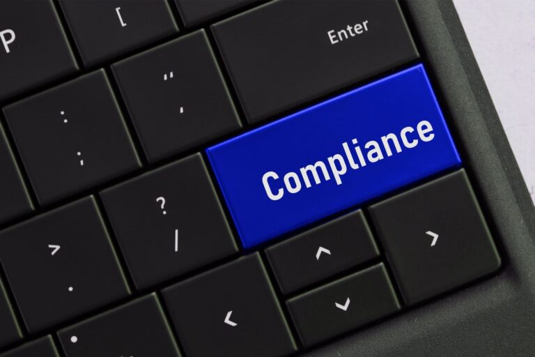 computer-keyboard-with-a-compliance-button-concept