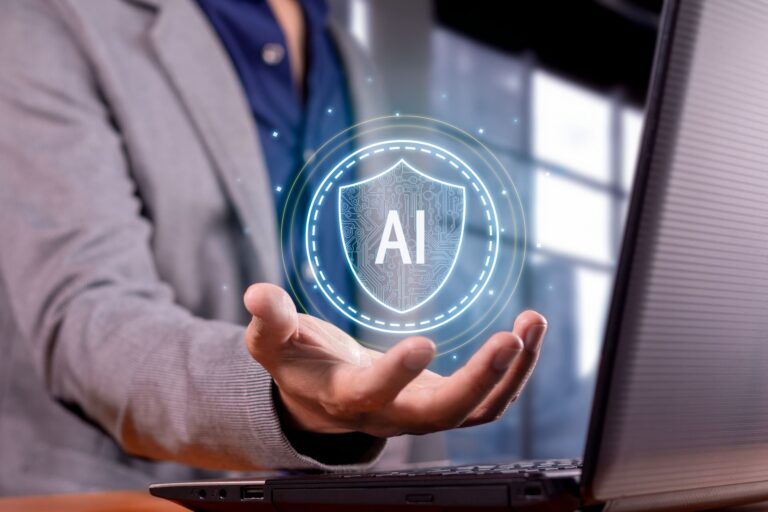 man-holding-a-digital-ai-shield-over-laptop