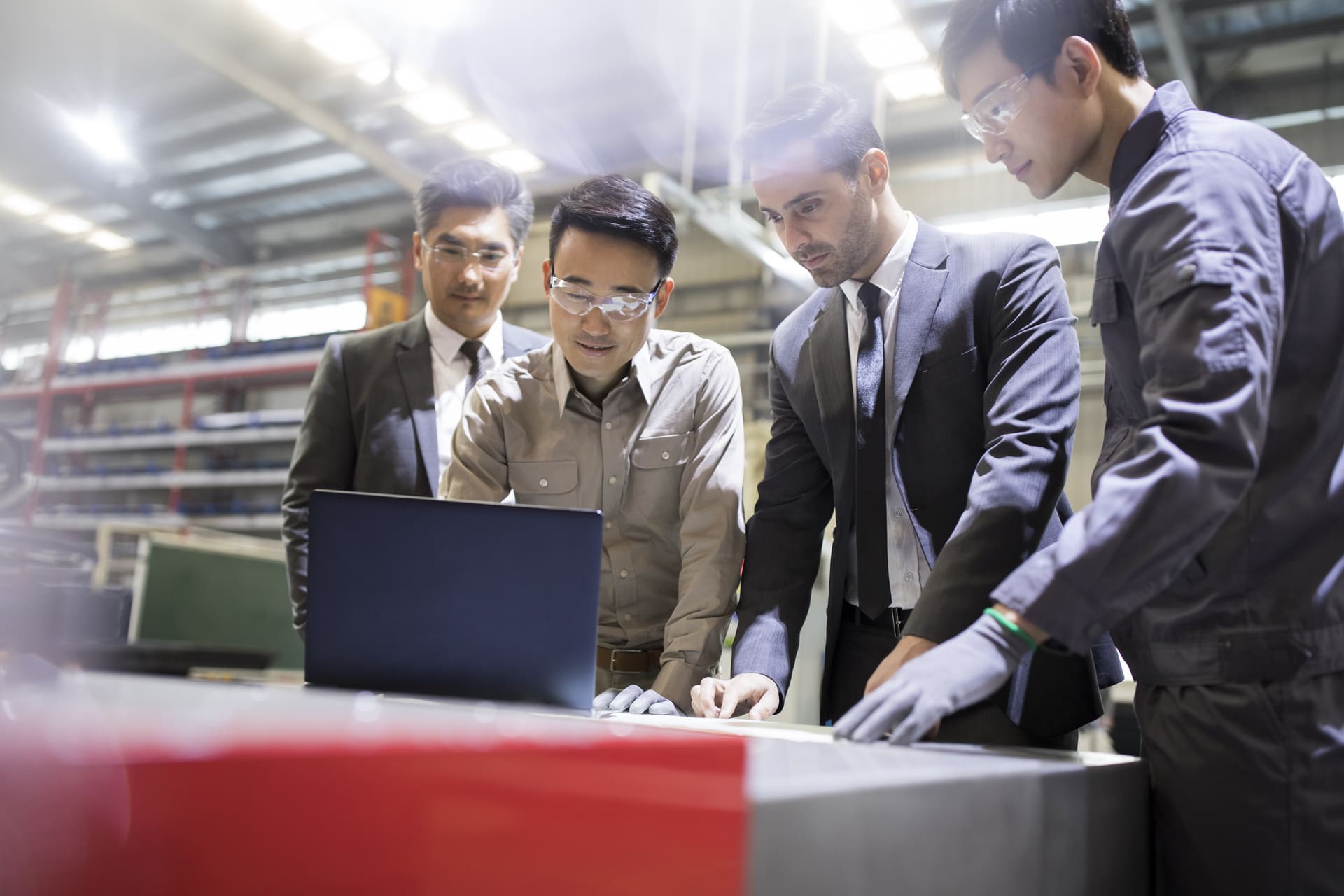 businessmen-and-engineers-talking-in-the-factory | CMIT Solutions businessmen-and-engineers-talking-in-the-factory