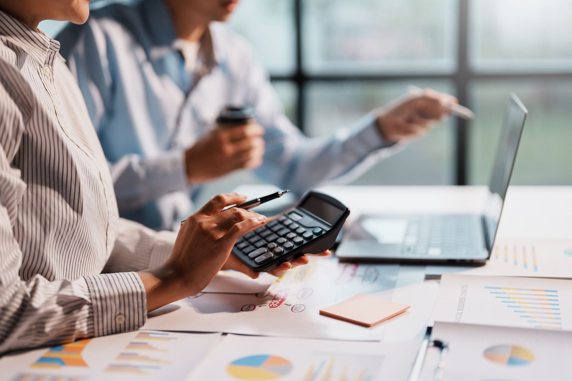 business-colleagues-analyze-business-data-in-office | CMIT Solutions business-colleagues-analyze-business-data-in-office