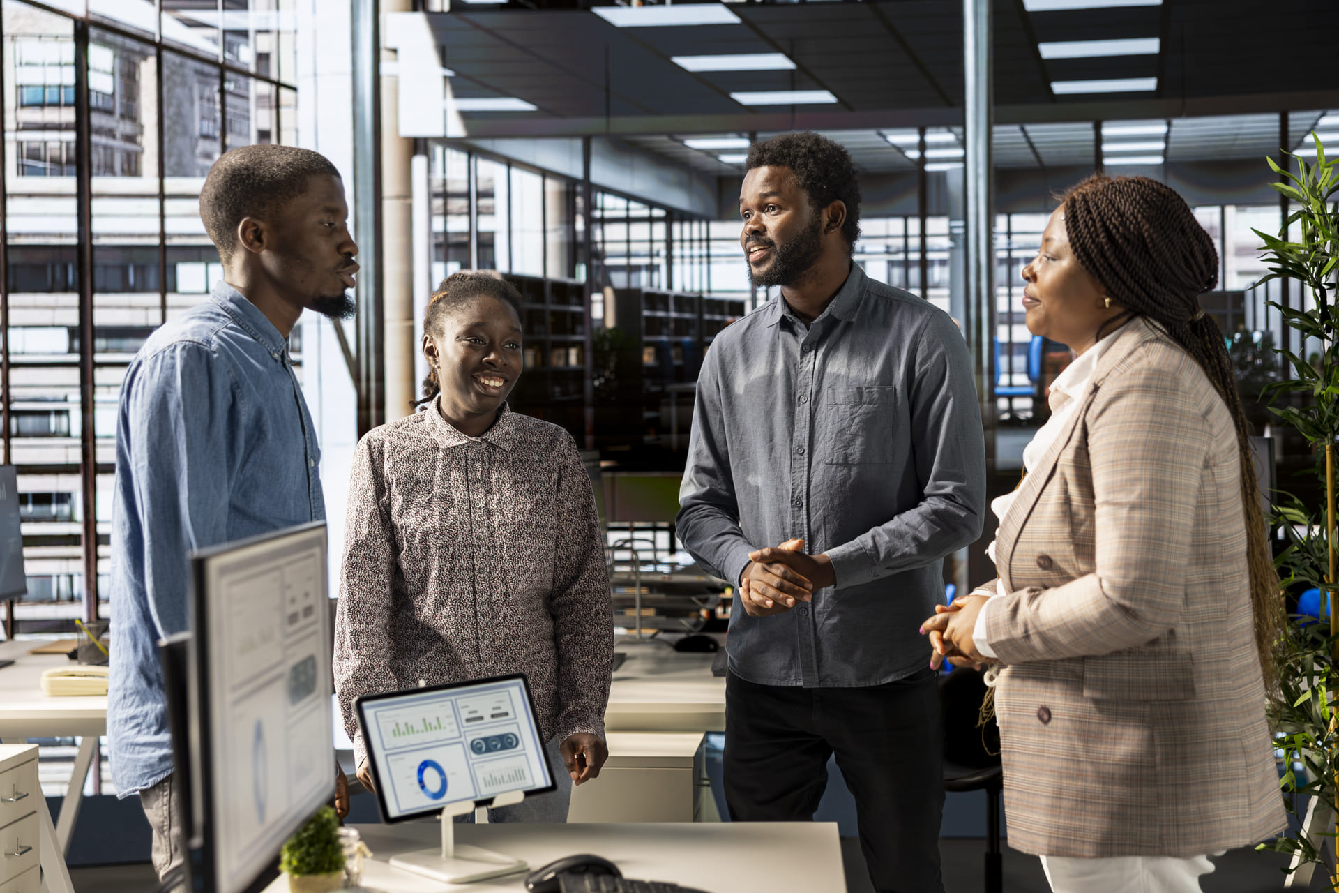 business-team-discussing-data-in-bright-modern-office | CMIT Solutions business-team-discussing-data-in-bright-modern-office