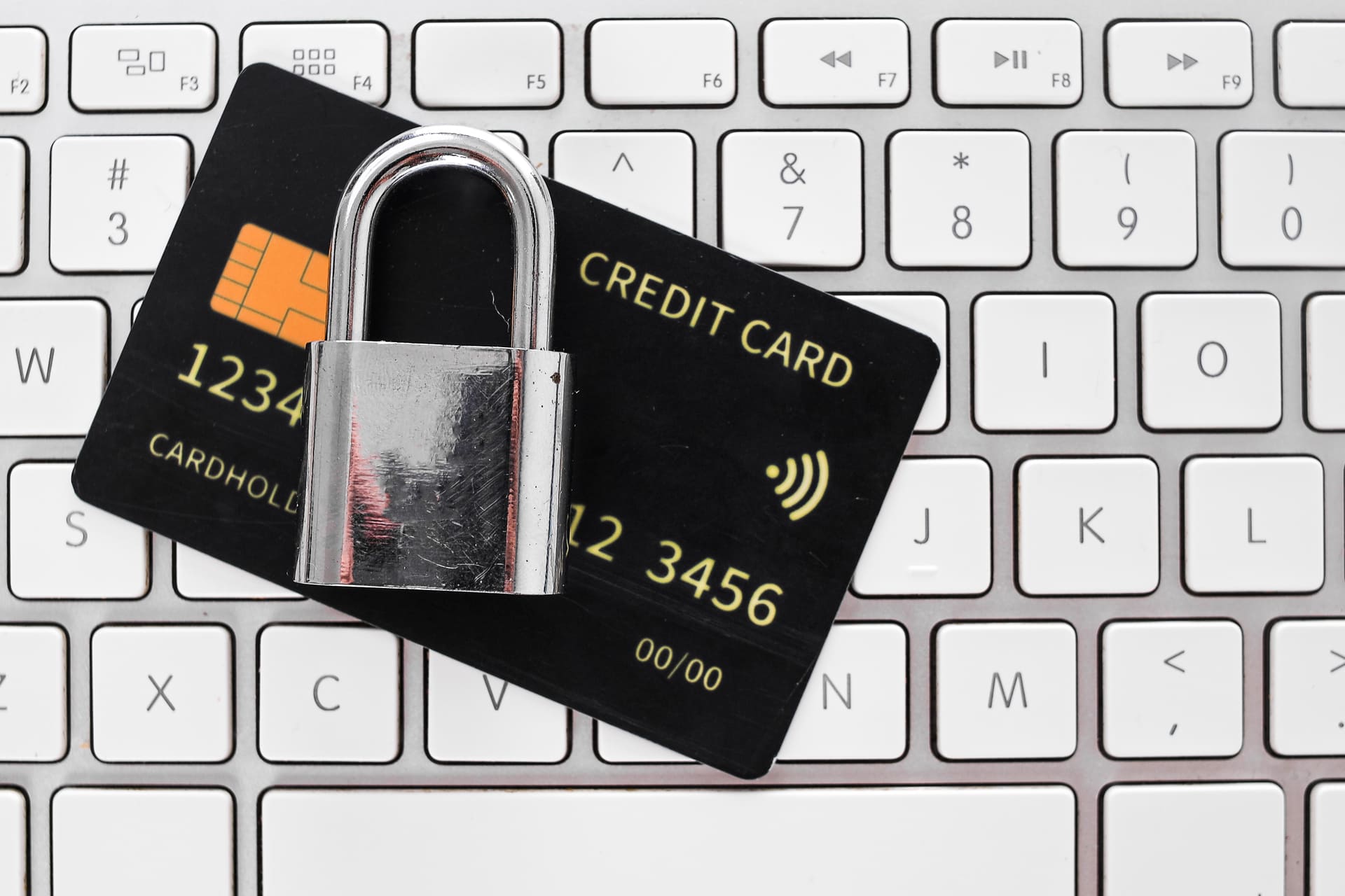credit-card-security-concept-with-padlock-on-keyboard | CMIT Solutions credit-card-security-concept-with-padlock-on-keyboard