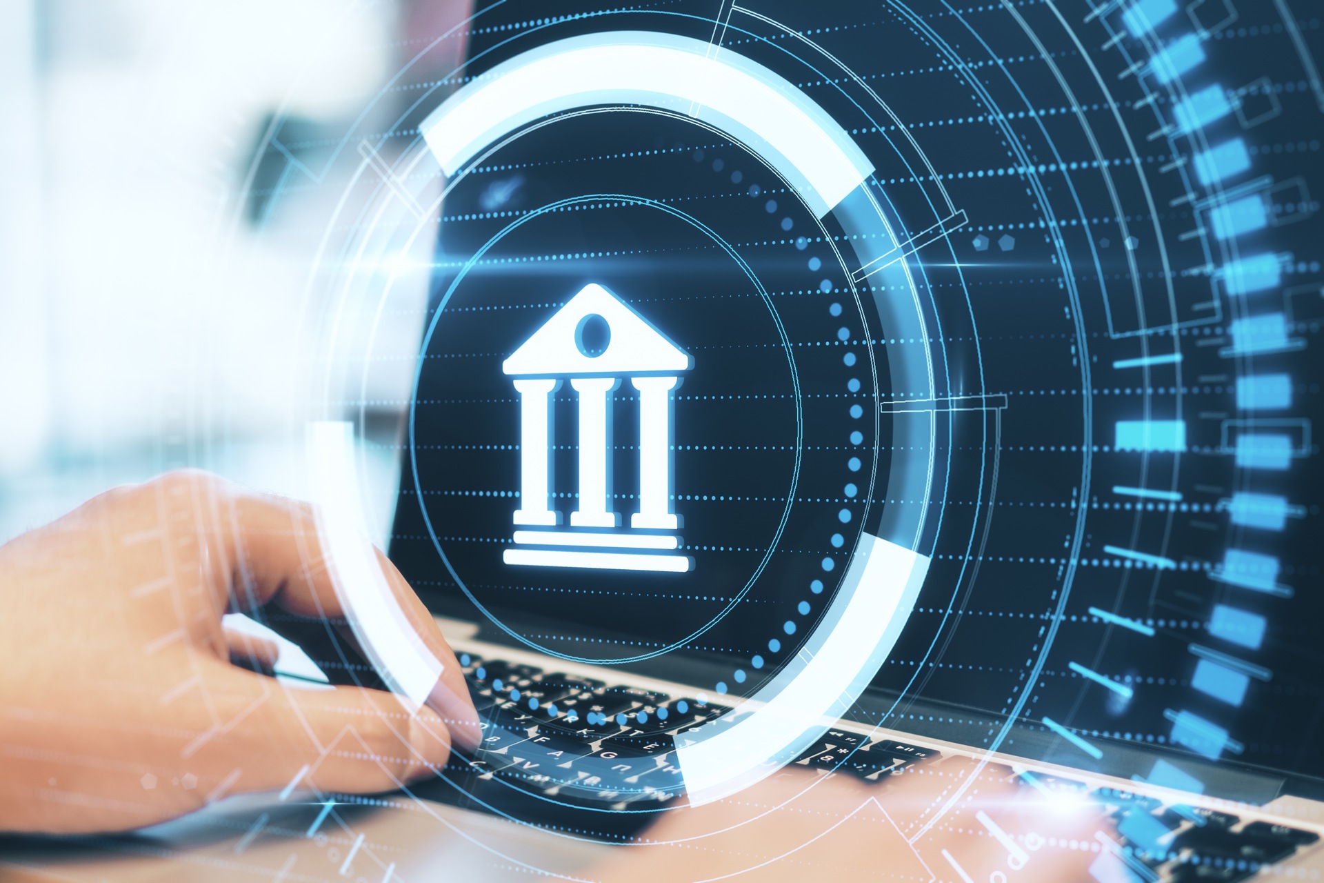 banking-technology-concept-on-laptop-with-blue-hologram | CMIT Solutions banking-technology-concept-on-laptop-with-blue-hologram