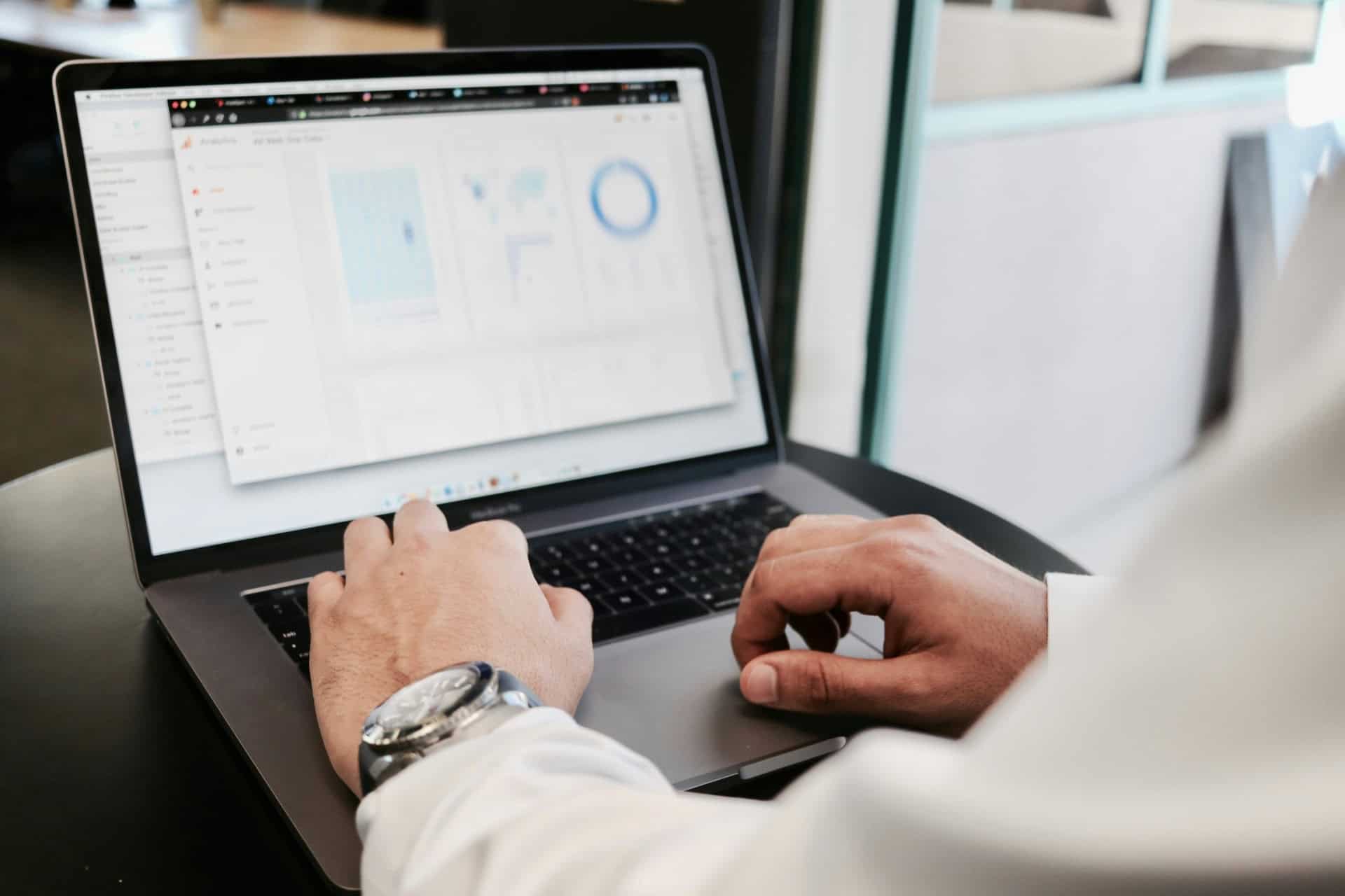 campaign-creators-774sCXD0dDU-unsplash-1920x1280 | CMIT Solutions Professional reviewing website analytics and performance data on a laptop.