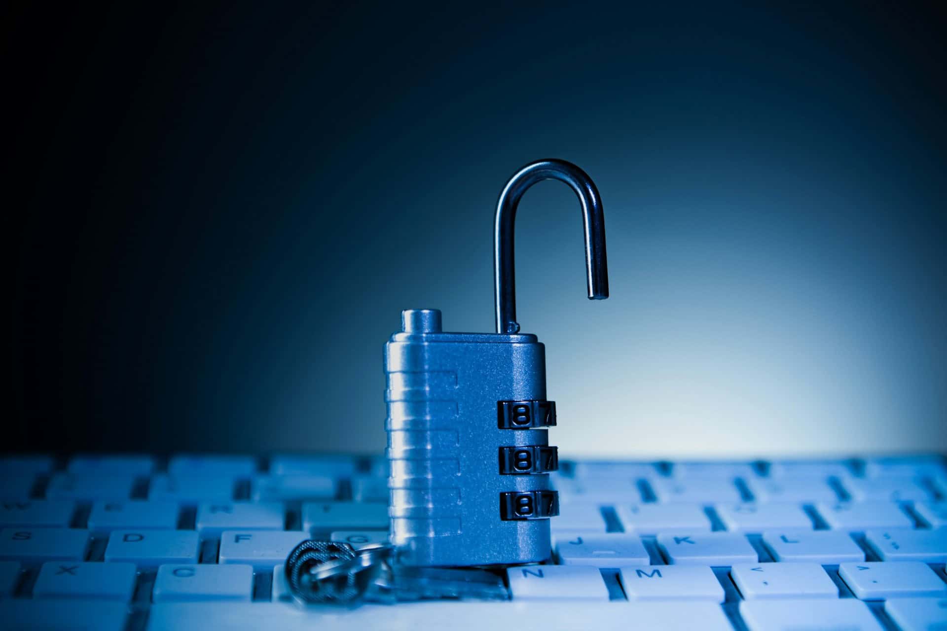 cybersecurity-unlocked-combination-padlock | CMIT Solutions Three-dimensional blue cloud with a padlock and upward arrows, representing secure cloud storage and data transfers.
